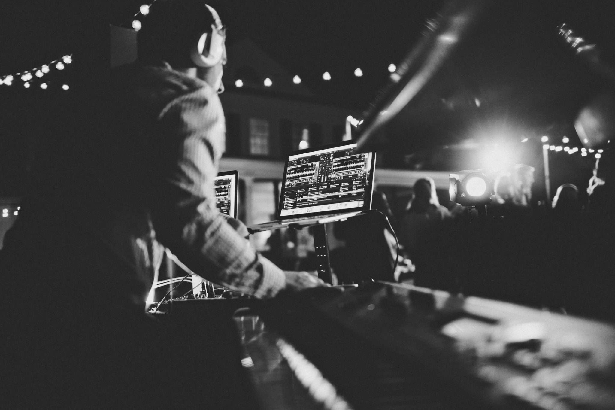 Stephen Darby DJing with live piano setup during a Charleston wedding reception.