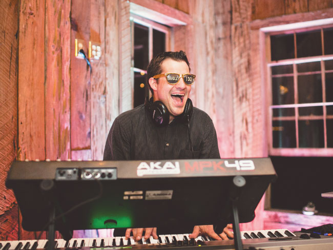 Stephen Darby performing DJ and live piano at a Charleston wedding.